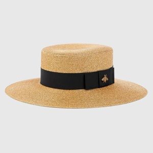 Gucci Tan Straw Hat with Black Ribbon